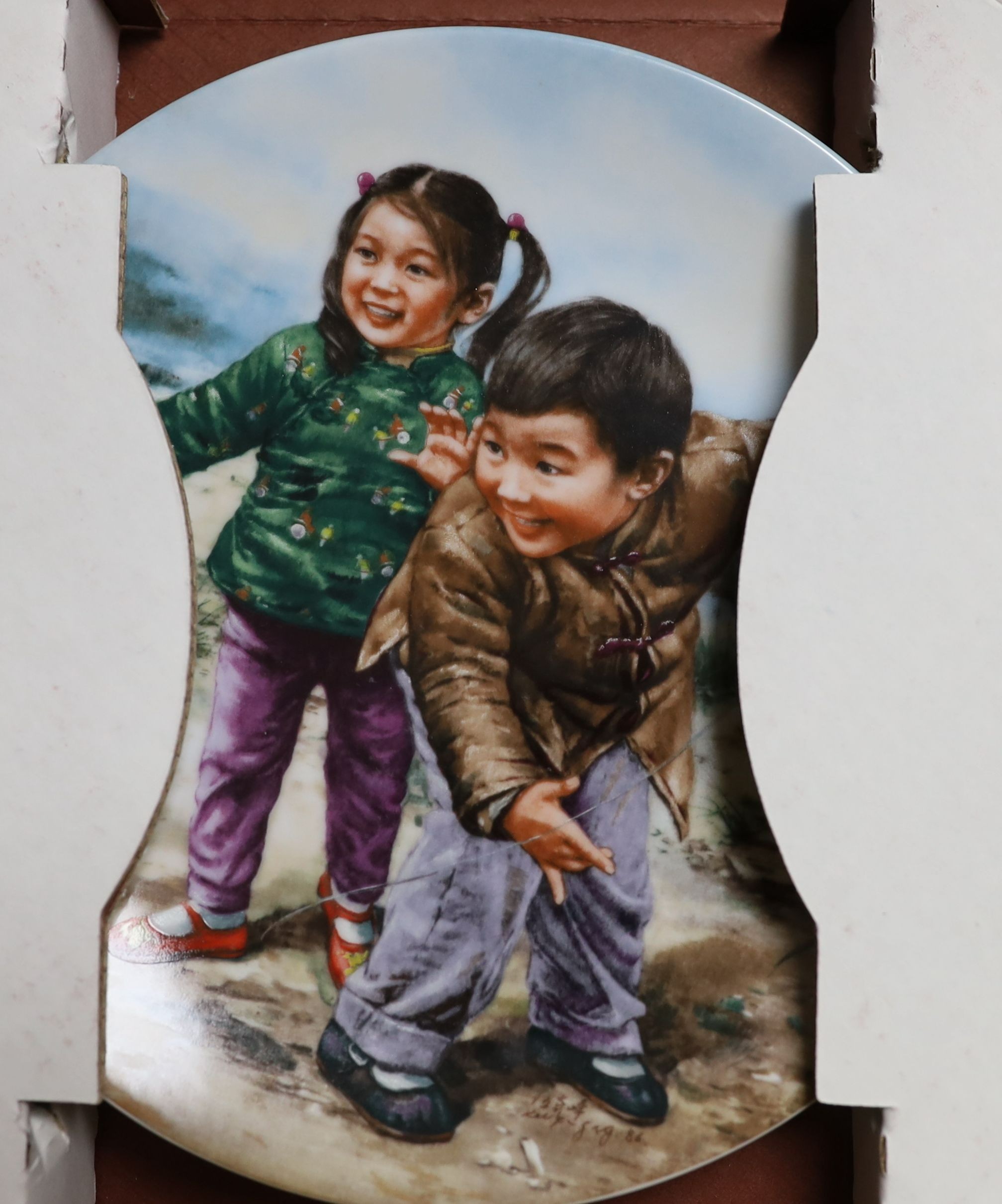 A set of six Chinese collector's plates in original boxes